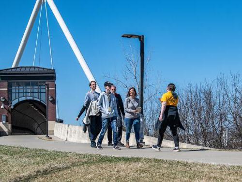 Prospective students take a campus tour.